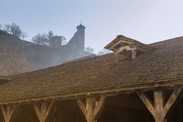 Medieval covered market hall oak roof structure - Cremieu France Europe