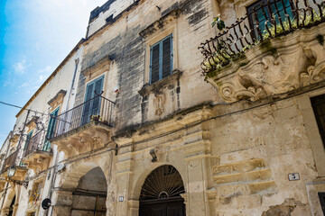 Obraz premium Galatina, Lecce, Puglia, Italy. Ancient village in Salento. The splendid stone buildings, in Baroque style, in the streets and narrow alleys of the historic center of the city.