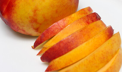 nectarine cut ready for consumption. fruit details. closeup on food.