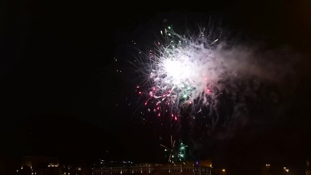 Beautiful fireworks with lots of details of explosions in the night sky in 4k resolution.