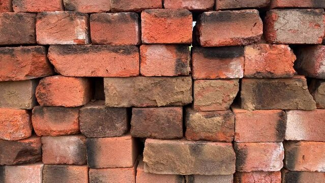 Video of background and texture of bricks in a craft factory in South America. Concept of industries.