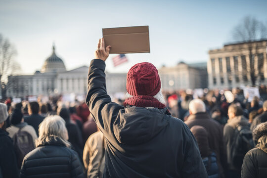 A person holding a protest sign against high taxes at a political rally. Concept of tax reform and activism. Generative Ai.