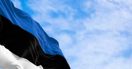 National flag of Estonia waving in the wind on a clear day