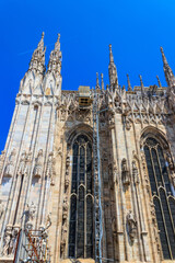 Naklejka premium Milan Cathedral, or Metropolitan Cathedral-Basilica of the Nativity of Saint Mary, is the cathedral church of Milan, Lombardy, Italy