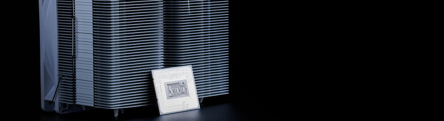 Modern powerful multi-core personal computer processor and a white metal radiator for cooling it....