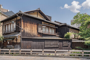 Fototapeta na wymiar Higashi Chaya District in Kanazawa, Japan. Great wooden vintage houses along the streets of this old town. 