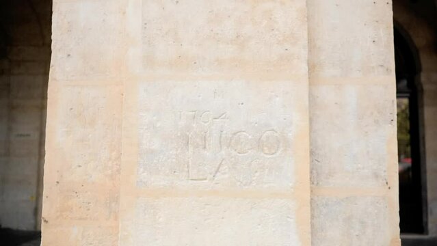 Oldest tag on Paris wall (Place des Vosges)
