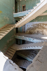 staircase in an abandoned interior, abandoned sanatorium