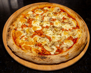 Traditional Brazilian chicken pizza with catupiry cheese and mushrooms