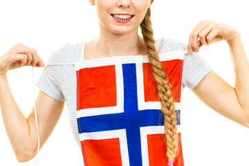 Young woman holding norwegian flag