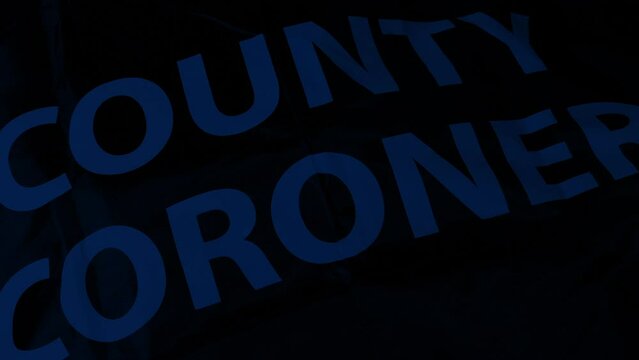 County Coroner Body Bag In Police Lights