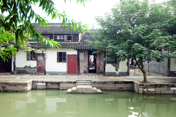 Fototapeta premium Zhujiajiao River in Qingpu, Shanghai, China is the construction of residential houses. Zhujiajiao is a famous historical and cultural town in China and a famous tourist destination.