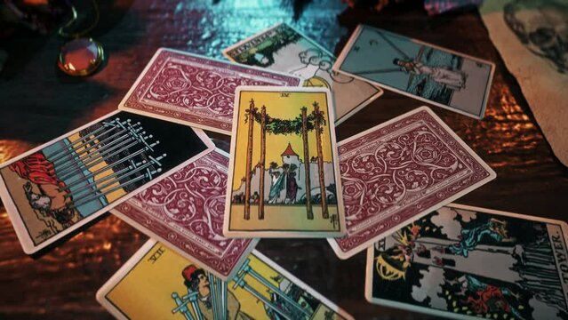 Rabat, Morocco - October 5, 2020. Spiritual mystery Tarot Card Reading ritual predicts life changes. Spiritual mystery Four of Wands forecasting change. Spiritual mystery seance foretells change.