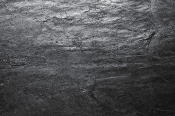 Texture of grey stone surface as background, closeup
