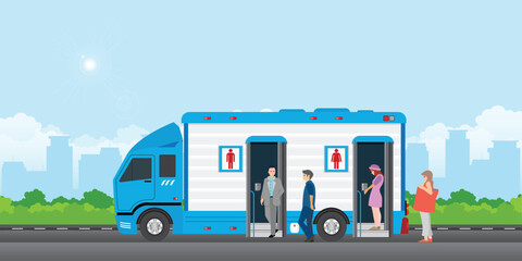 Fototapeta premium People queue to enter the toilet bus or mobile toilet.