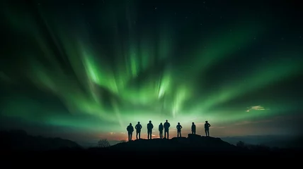 Fotobehang northern lights in the night sky, aurora borealis, a group of people watching the night landscape with a multicolored glow in the sky © kichigin19