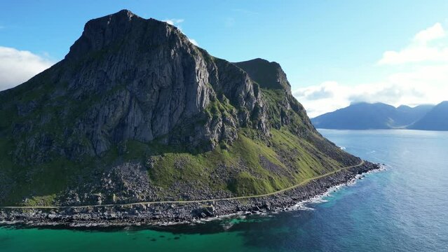 Rocky Island and Blue Sea at Lofoten Islands in Norway, Scandinavia - Aerial Circling