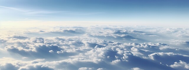 a view of the sky from a plane window of clouds
