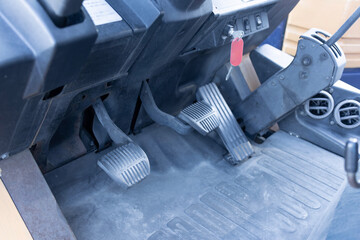 Image of forklift foot pedals - obrazy, fototapety, plakaty