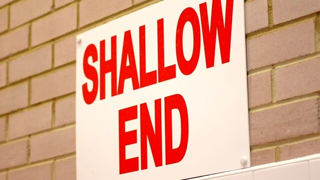 Shallow End Sign at Public Swimming Pool for Safety of swimmers