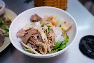 wet rice cake with chicken and tripe