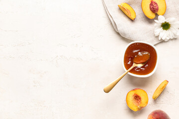 Composition with bowl of sweet peach jam and fresh fruits on light background