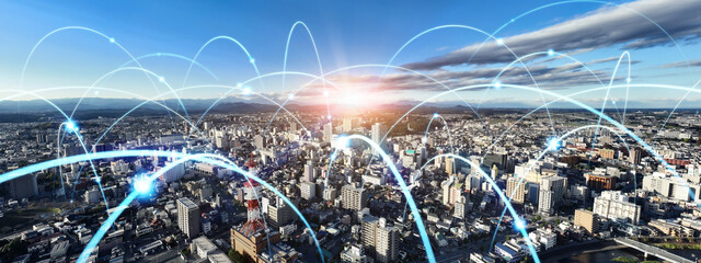 Modern cityscape and communication network concept. Telecommunication. IoT (Internet of Things). 5G. Smart city. Digital transformation. - obrazy, fototapety, plakaty