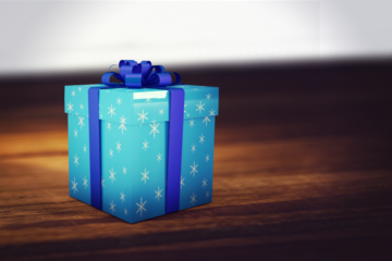 Digital png illustration of blue gift on wooden floor on transparent background