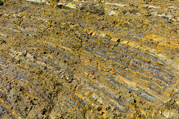 Close-up of a weathered rocky cliff face near Devils Slide Trail