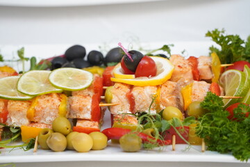 Fresh fruits and berries stacked on a plate
