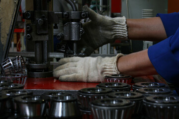 Worker in the production of bearings