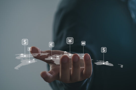 Global bank business and currency exchange and investment concept, money, finance, Businessman with virtual world map and connection line effect, dollar yuan yen euro and pound sterling sign. - Powered by Adobe