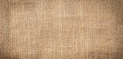 Brown canvas fabric for background, linen texture background