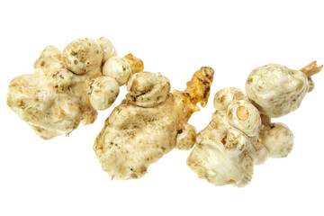Jerusalem artichoke sweet potato tubers on white background.