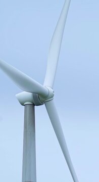  wind turbine against a blue sky summers day time lapse with mov