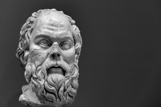 Socrates philosopher. Ancient portrait bust. Monochrome, selected focus, dark background. October 05, 2023. Selcuk (Izmir), Turkey (Turkiye)