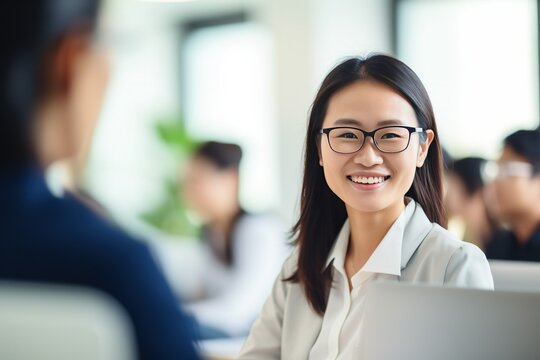 Focus portrait of a manager, business woman in harmony meeting room with blurred colleagues working together, analyzing financial reports and dashboard data in background