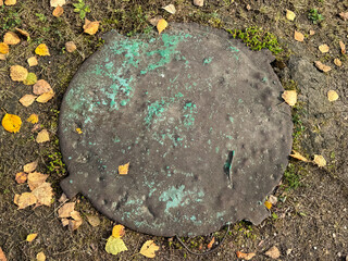Sewer hatch on the ground in the park