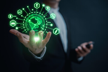 green Energy saving concept Man holding planet Earth as a green, ecological and renewable energy world concept. Eco concept, ecology, clean energy and environment.