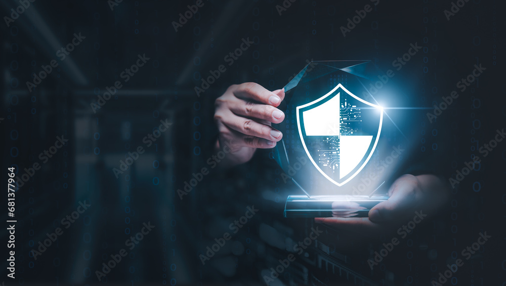 Wall mural cybersecurity concept. businessman holding shield protect icon cybersecurity privacy of data protect
