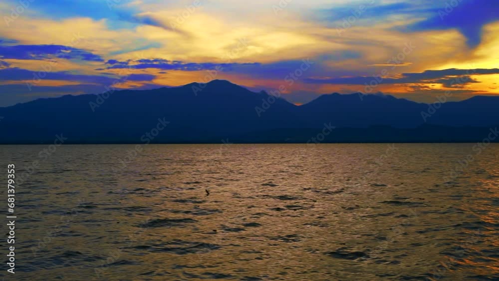 Sticker 4K video of Kwan Phayao lake with cloud in the sunset time, Thailand.