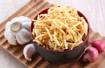 French fries sliced the size of matchsticks, dry fried, usually some are savory and some are spicy