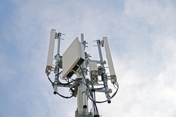 Small Cell 3G, 4G, 5G System. Macro Base Station or Base Transceiver Station on electricity post. Wireless Communication Antenna Transmitter.