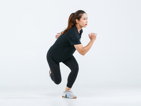 Portrait Isolated Cutout Full Body Studio Shot Strong Asian Female Fitness Athlete Sportswoman Trainer Model In Casual Sport Workout Outfit Posing One Leg Squat Training Exercising On White Background