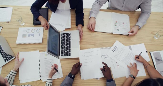 Hands, documents or business people in meeting for report, agenda discussion or sales data analysis. Above, teamwork or workers in office talking, planning or speaking of portfolio or audit paperwork