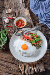 Stir fried Thai basil with minced pork and a fried egg