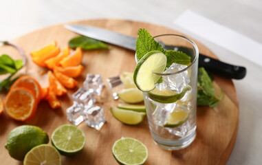 Mojito cocktail with vodka leaf mint and lime pint printing for skinned kitchen background interior bar products home furnishings trendy design black gray gradient sliced fruits and ice.