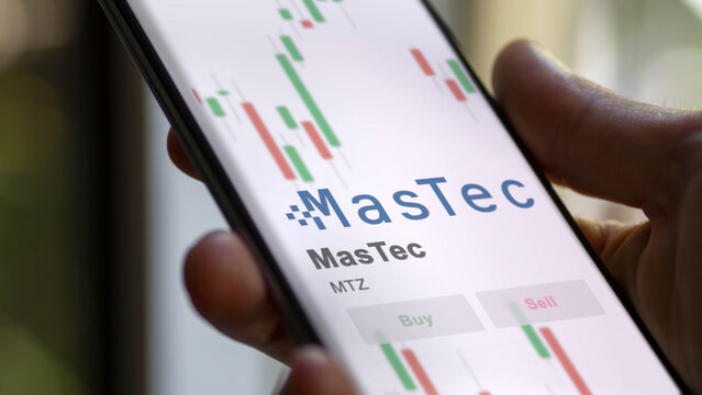 November 21st 2023. The trading page of MasTec on a stock exchange, a shareholder analyzing $MTZ on a device.
