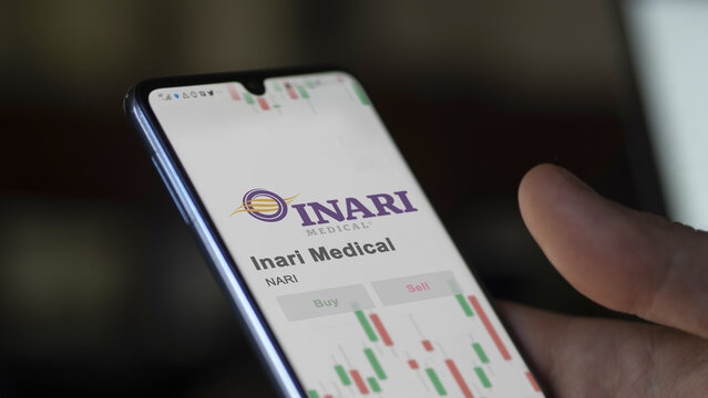 November 21st 2023. The trading page of Inari Medical on a stock exchange, a shareholder analyzing $NARI on a device.