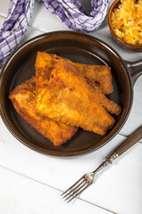 Pieces of cod in breadcrumbs.
